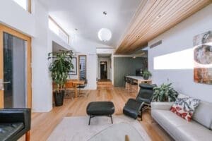 Modern Australian living space by Coys Constructions featuring timber finishes, natural light, and minimalist design.